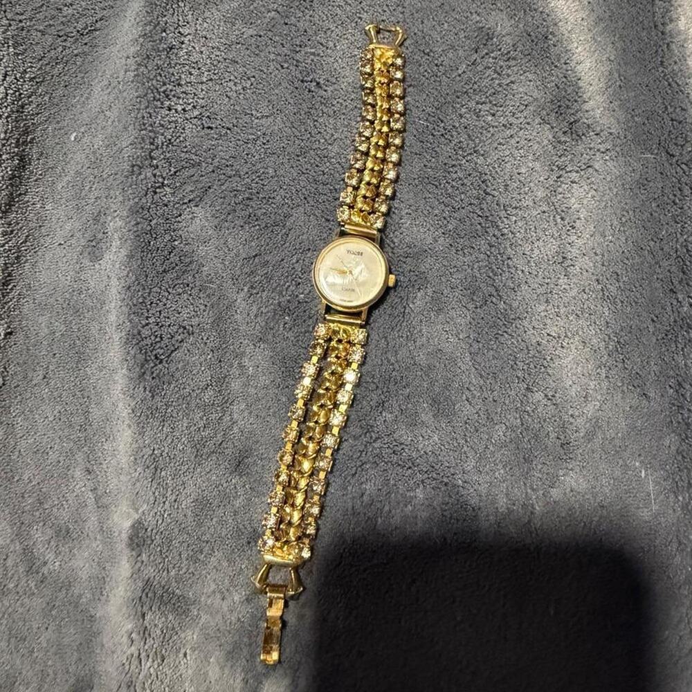 Vintage visage gold tone watch